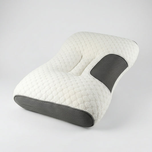 Almohada cervical ergonómica blanca con laterales de malla gris